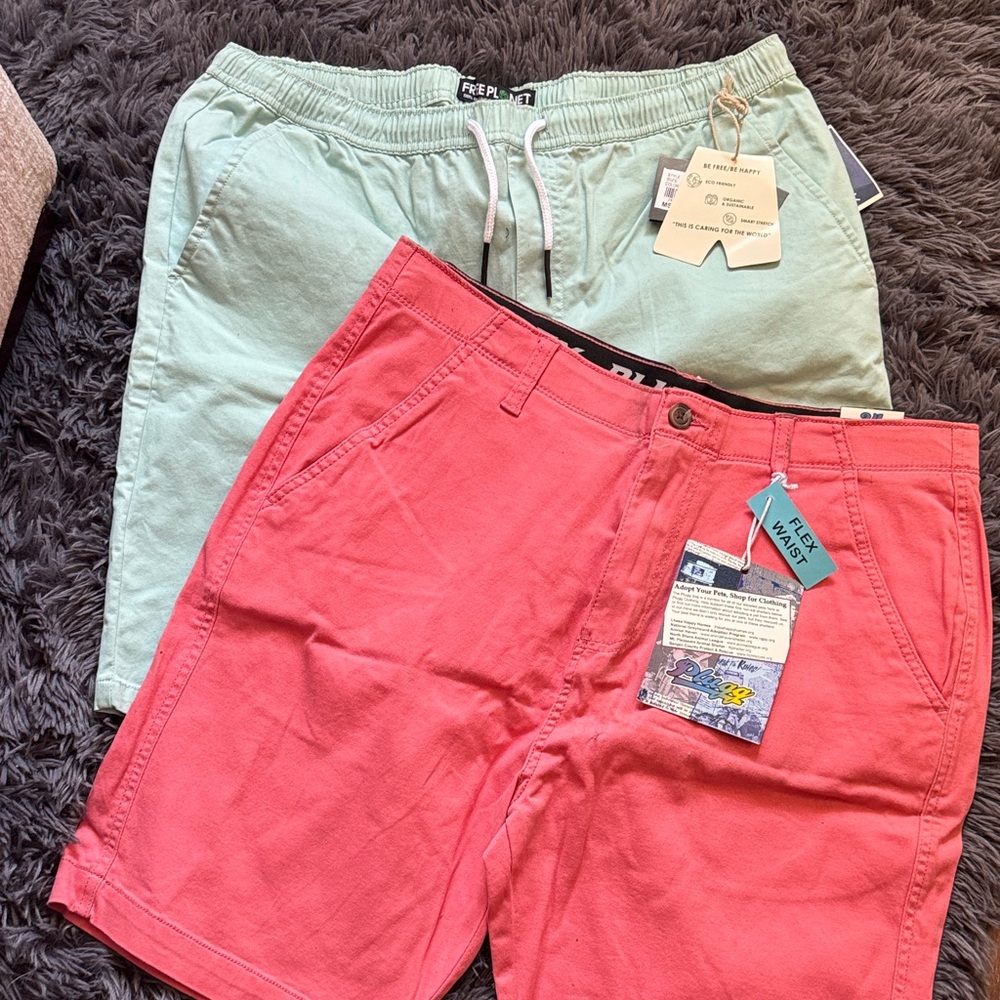 Mens 2 pair shorts Coral Stretch Shorts and mint green shorts.